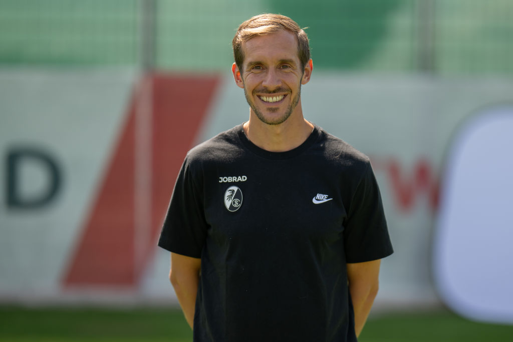 Julian Schuster, Head coach of Sport-Club Freiburg poses during the team presentation at Europa-Park Stadion on August 08, 2024 in Freiburg im Breisgau, Germany.