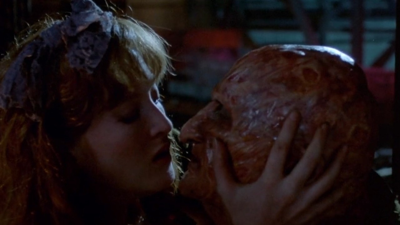 Kim Myers preparing to kiss Freddy Krueger in A Nightmare on Elm Street 2: Freddy's Revenge