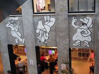 All sorts of Husk Mit Navn artwork appears in the concrete building