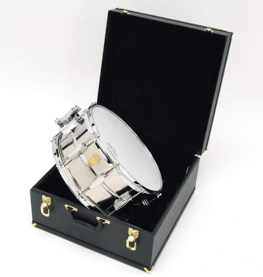 A fur-lined presentation case with brass corners is included.
