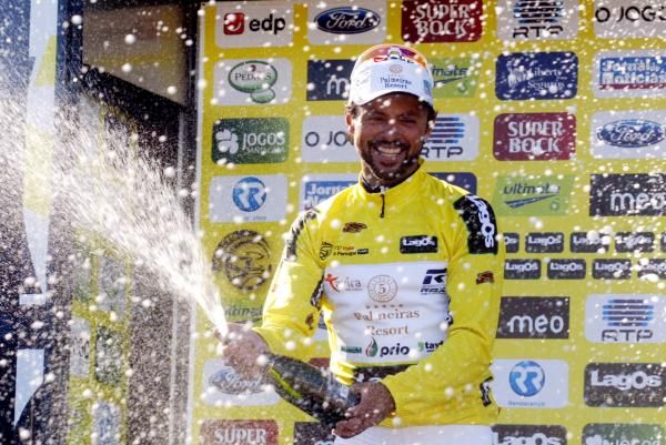 Candido Barbosa celebrates taking the overall lead.