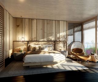Bedroom with double bed and wood panelled walls