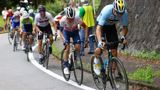 Adam Yates of Team Great Britain & Wout van Aert of Team Belgium in the breakaway during the Men's road race at the Fuji International Speedway on day one of the Tokyo 2020 Olympic Games