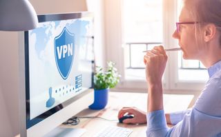 Person using VPN software in a home office