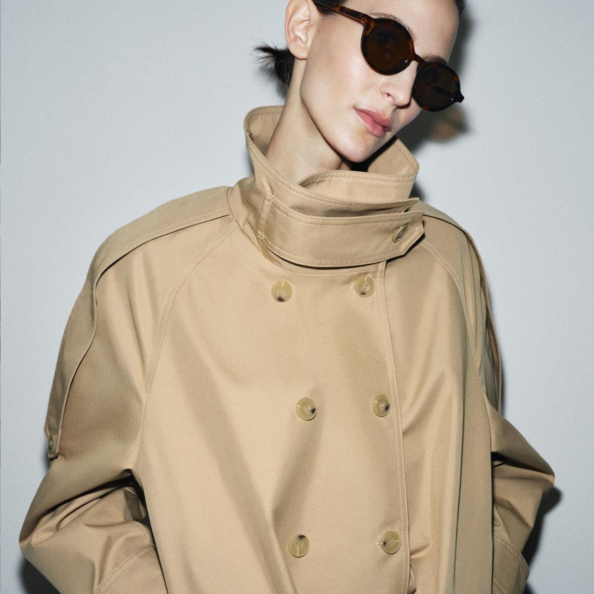 Model wears Zara funnel-neck trench coat
