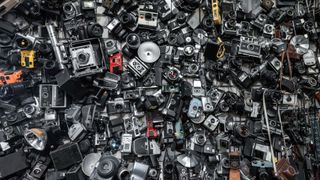 huge heap of heap of old vintage film cameras and retro lenses