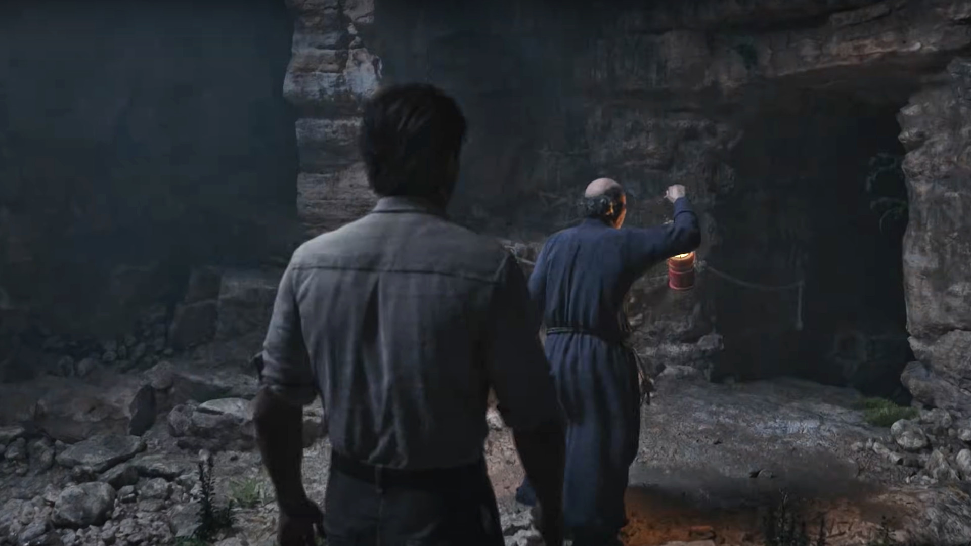 Enzo Favara following a monk at night during the new game, Mafia: The Old Country.