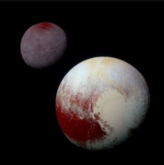  Pluto and one of its moons, Charon, located in the Kuiper Belt.