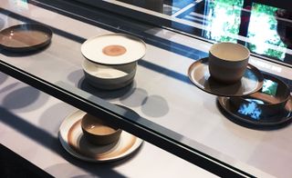 Brown ceramic plates & cups