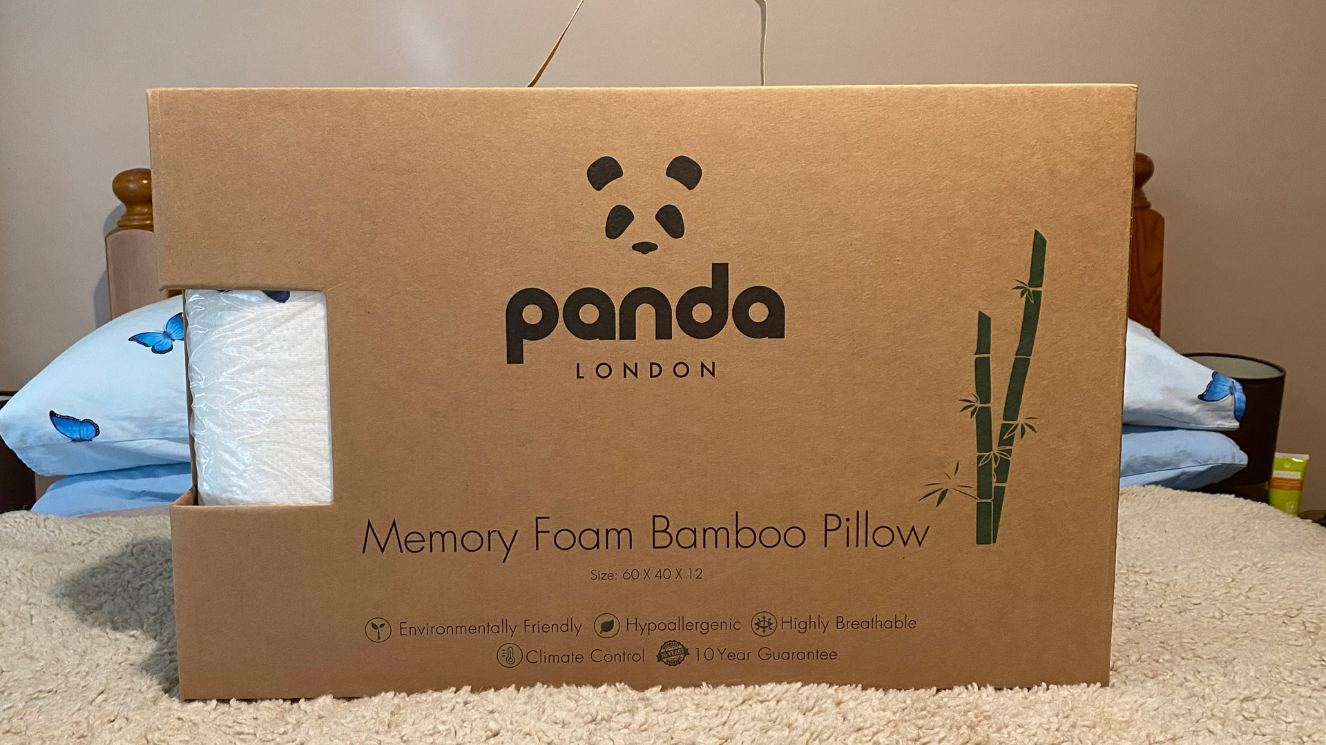 The Panda Memory Foam Bamboo Pillow in its delivery box