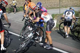 Fabian Cancellara (RadioShack-Nissan) picks himself up from a crash.