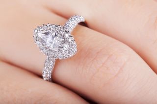 Diamond ring on woman's finger