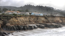 Cliffside homes along the Oregon Coast in danger due to erosion.