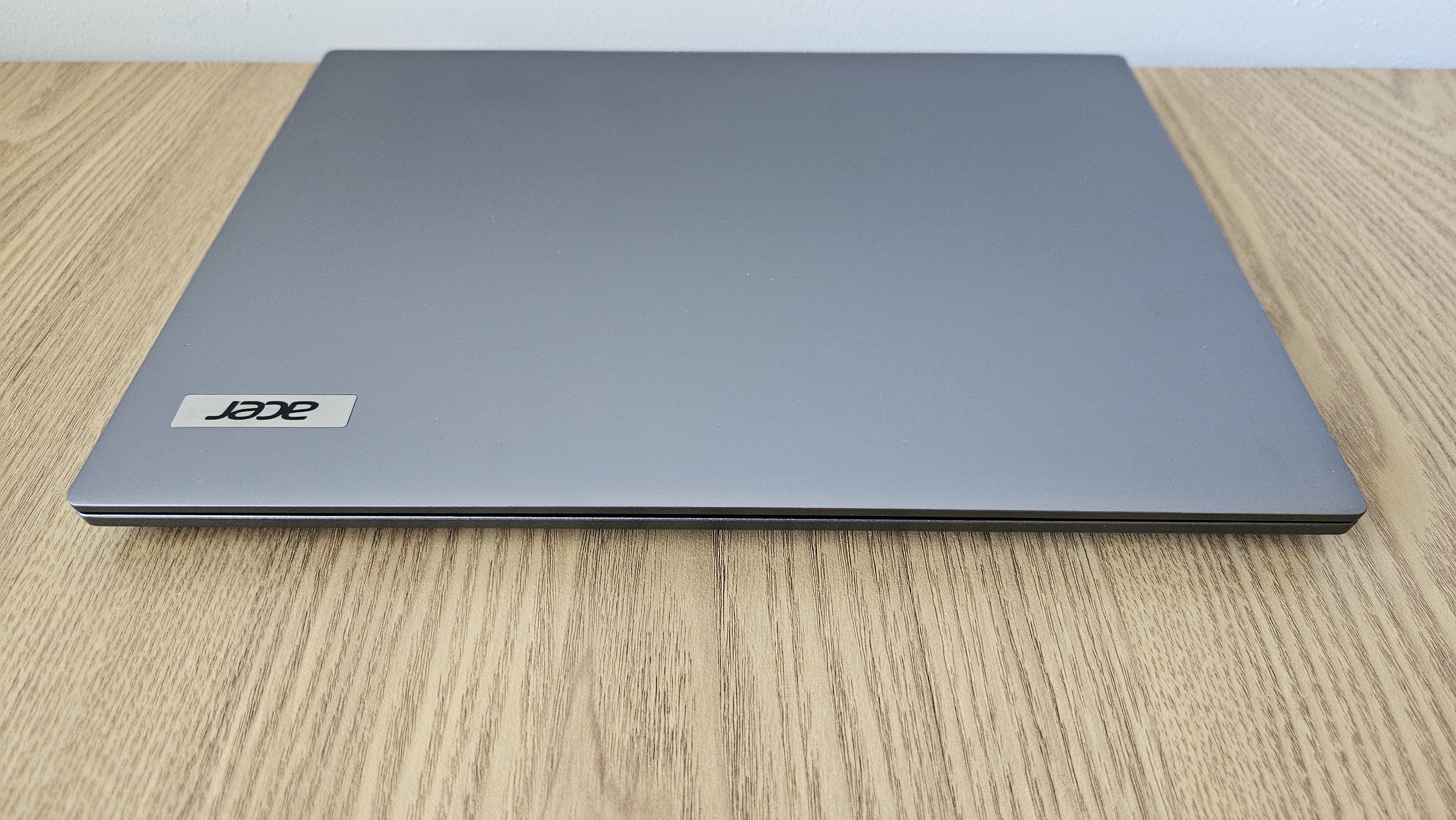 The Acer TravelMate X14 AI on a desk