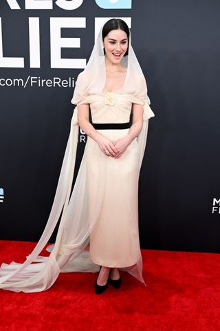 Gracie Abrams wearing a hooded chanel gown on the 2025 grammys red carpet