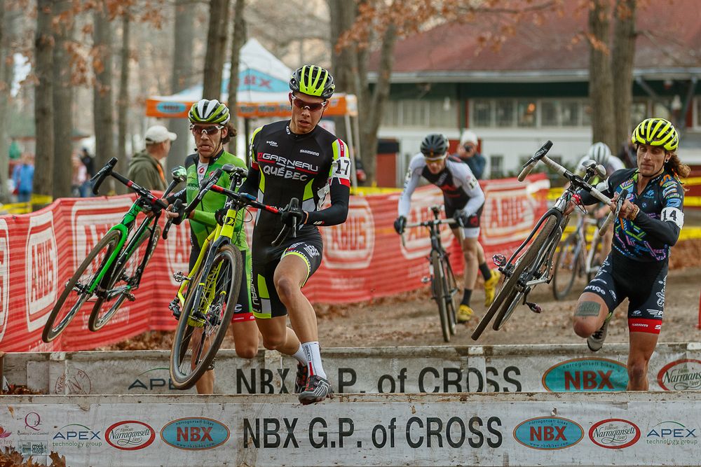 The lead group flies through the barriers
