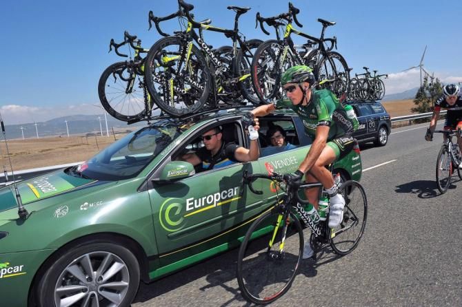 Vincent J&eacute;r&ocirc;me collecing bottles from the Europcar car