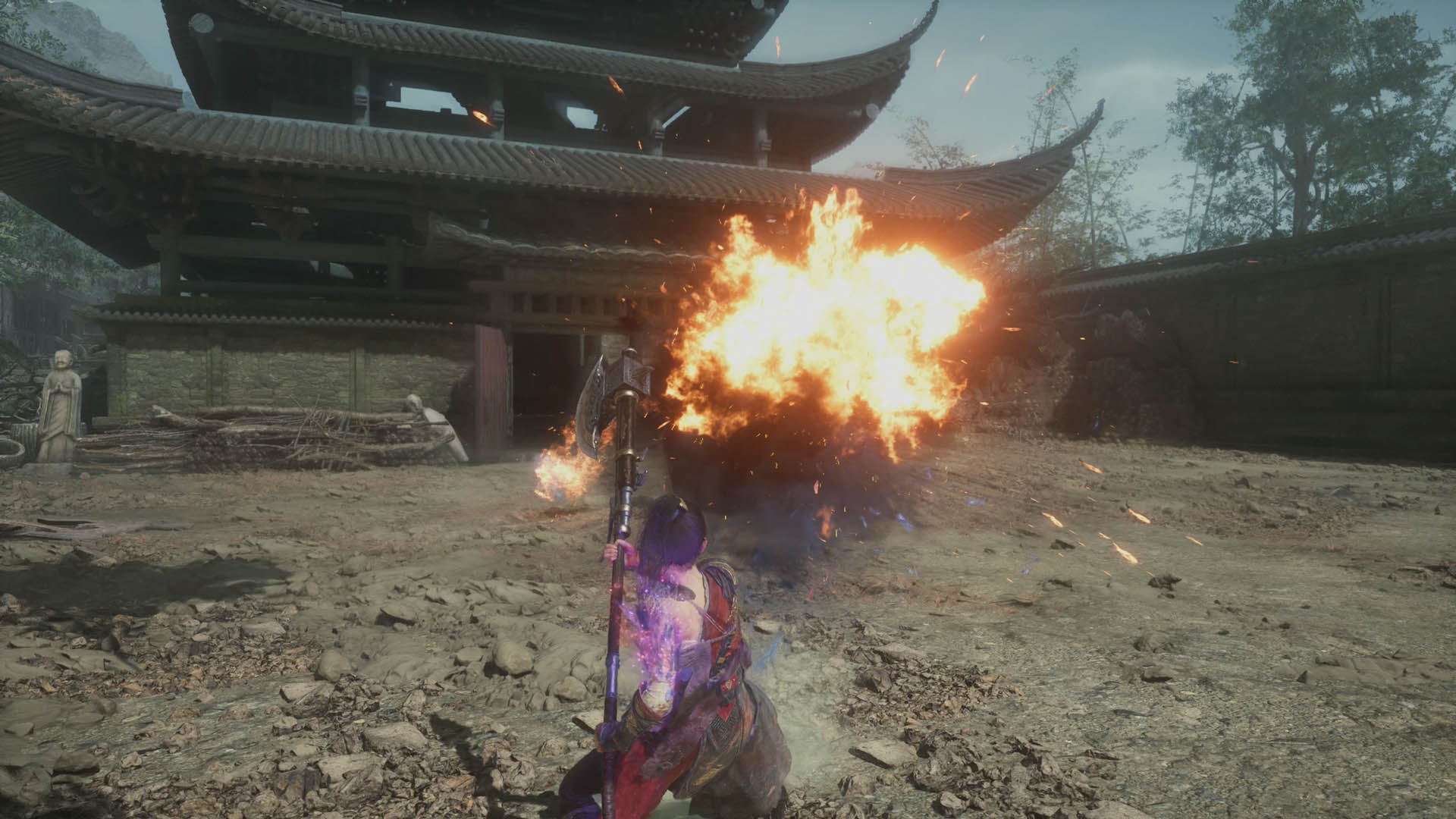 Blasting an enemy with fire in Wuchang: Fallen Feathers
