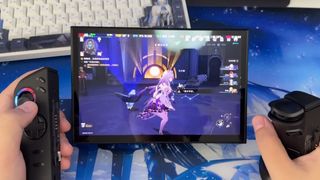 A seeming prototype of a Lenovo Legion Go 2 handheld gaming PC playing a game with the controllers detached