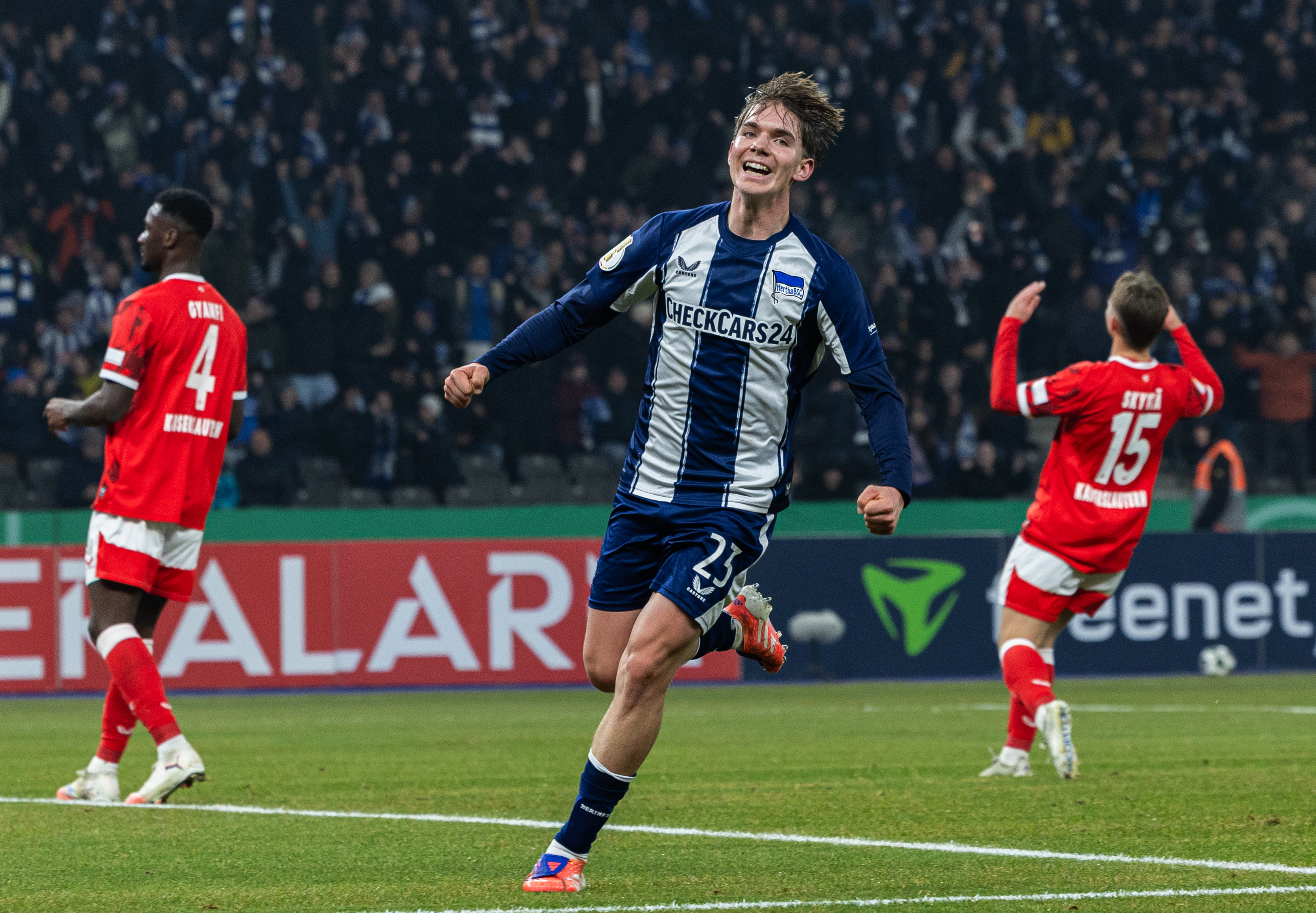 Kennet Eichhorn of Hertha BSC celebrates after scoring his team's third goal during the DFB Cup round of 16 match between Hertha BSC and 1. FC Kaiserslautern at Olympiastadion