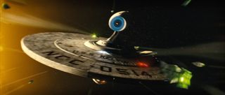 A ship traverses the unknown frontier of space in "Star Trek" (2009).