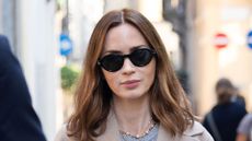 Emily Blunt wearing cosy-chic outfit formula on October 08, 2025 in Milan, Italy