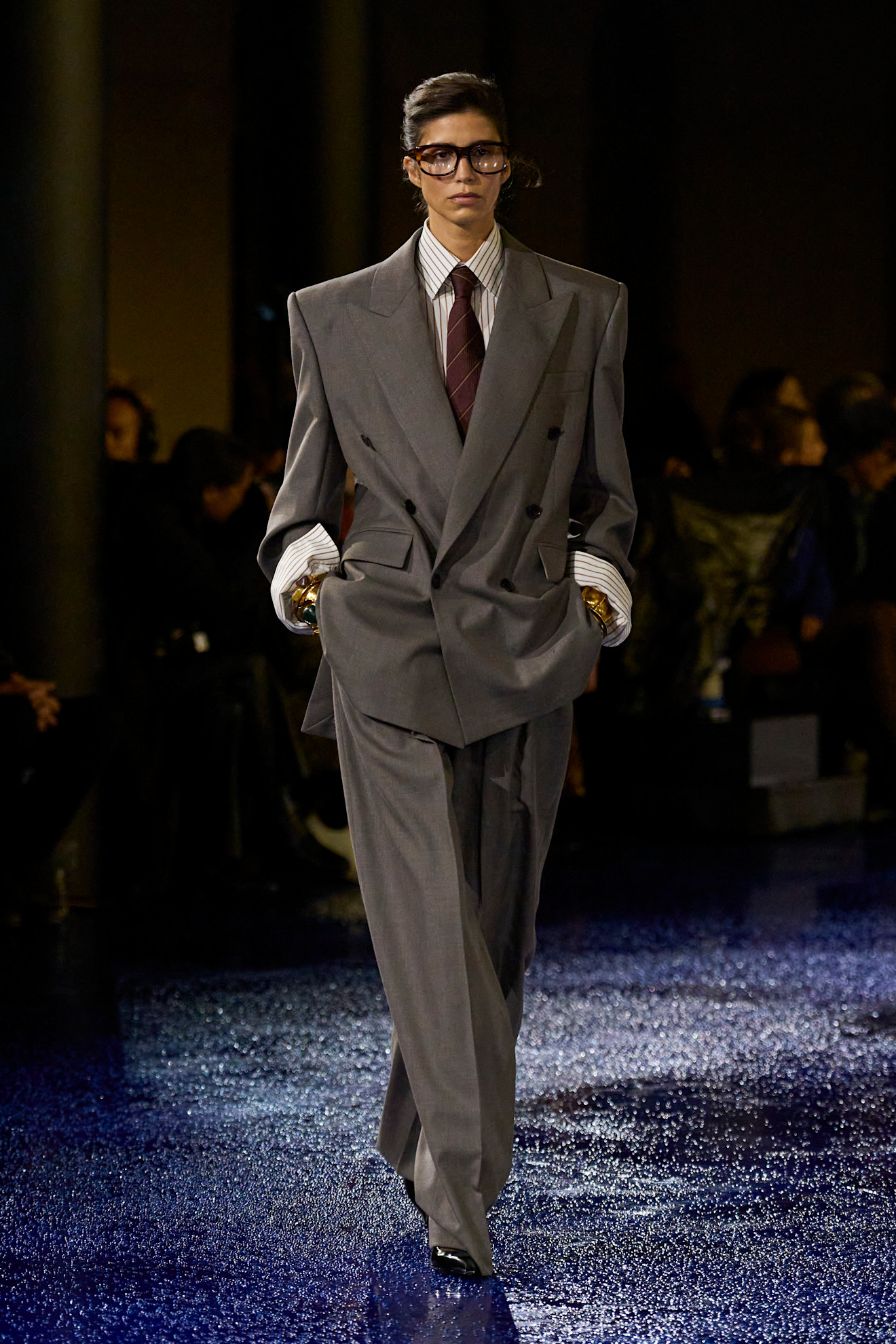 An image of the grey and burgundy outfit trend on the Saint Laurent spring/summer 2025 runway.