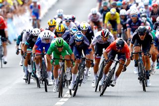 Nacer Bouhanni (right) sprinting to the line in Châteauroux against Mark Cavendish and Jasper Philipsen