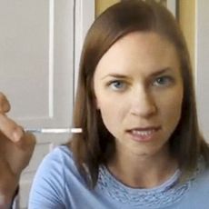 woman with pregnancy test