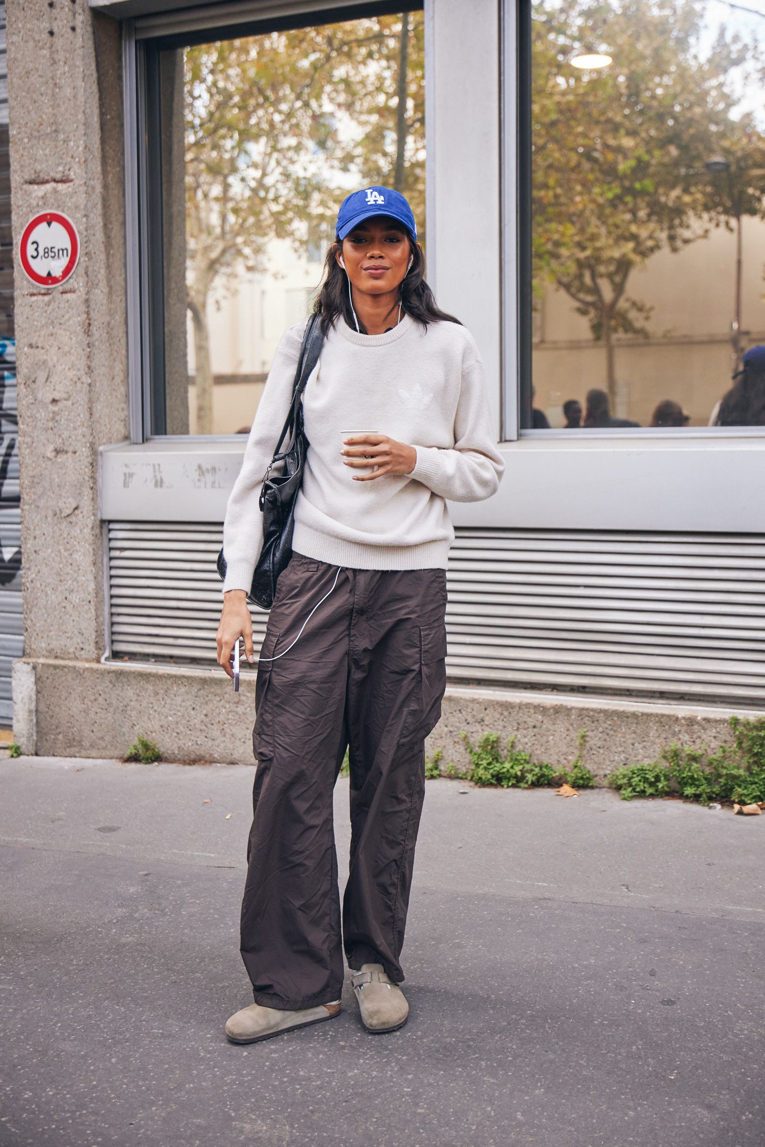A Paris Fashion Week attendee shows off their outfit.