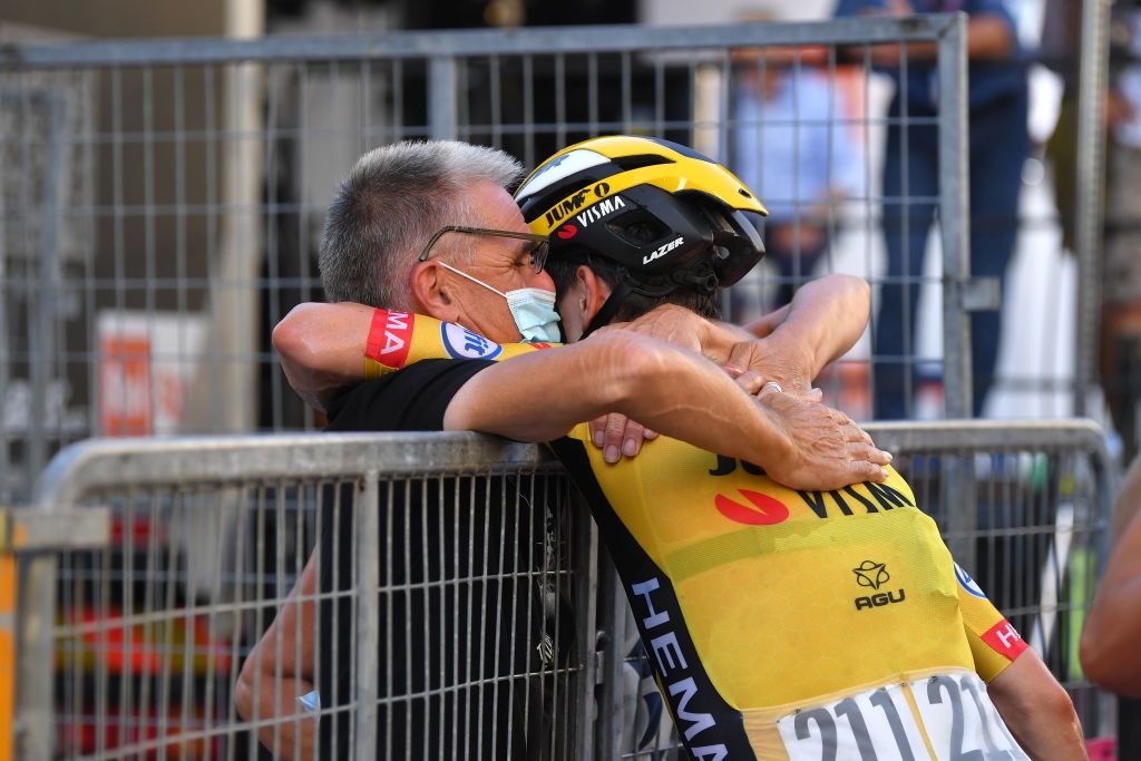 Van Aert embraces his father on the Via Roma