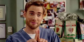 Dustin Milligan as Ted Mullens in Schitt's Creek.