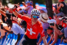 Switzerland's Mauro Schmid of Team Jayco Alula crosses the line to win the 2025 Cadel Evans Great Ocean Men's Elite Road Race in Geelong on February 2, 2025. (Photo by CHRIS PUTNAM / AFP) / -- IMAGE RESTRICTED TO EDITORIAL USE - STRICTLY NO COMMERCIAL USE --