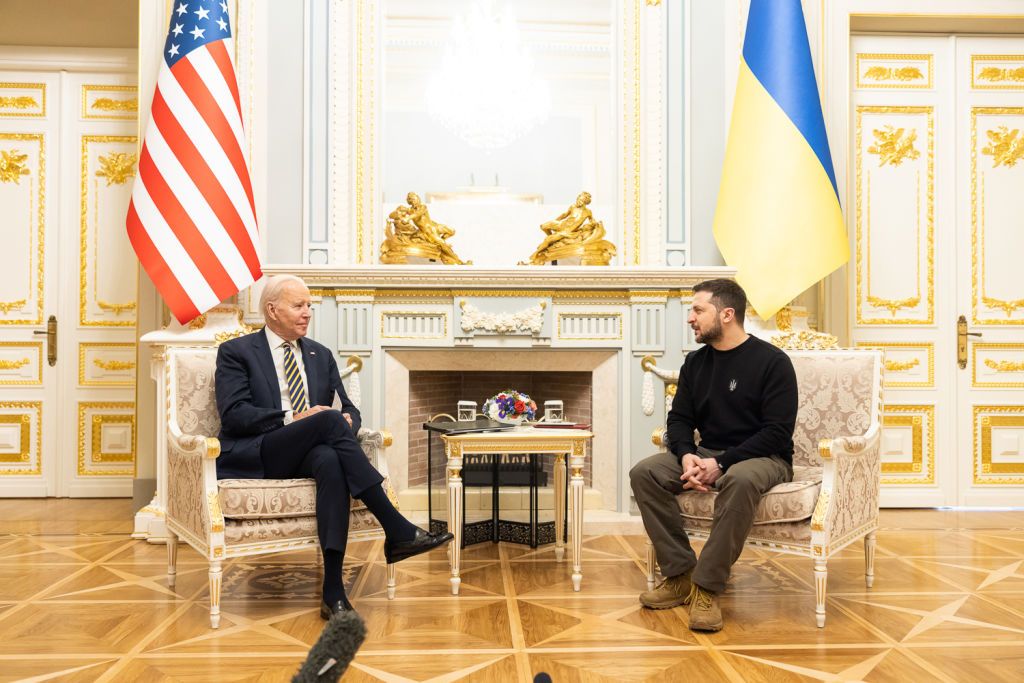 Biden and Zelensky sitting and talking.