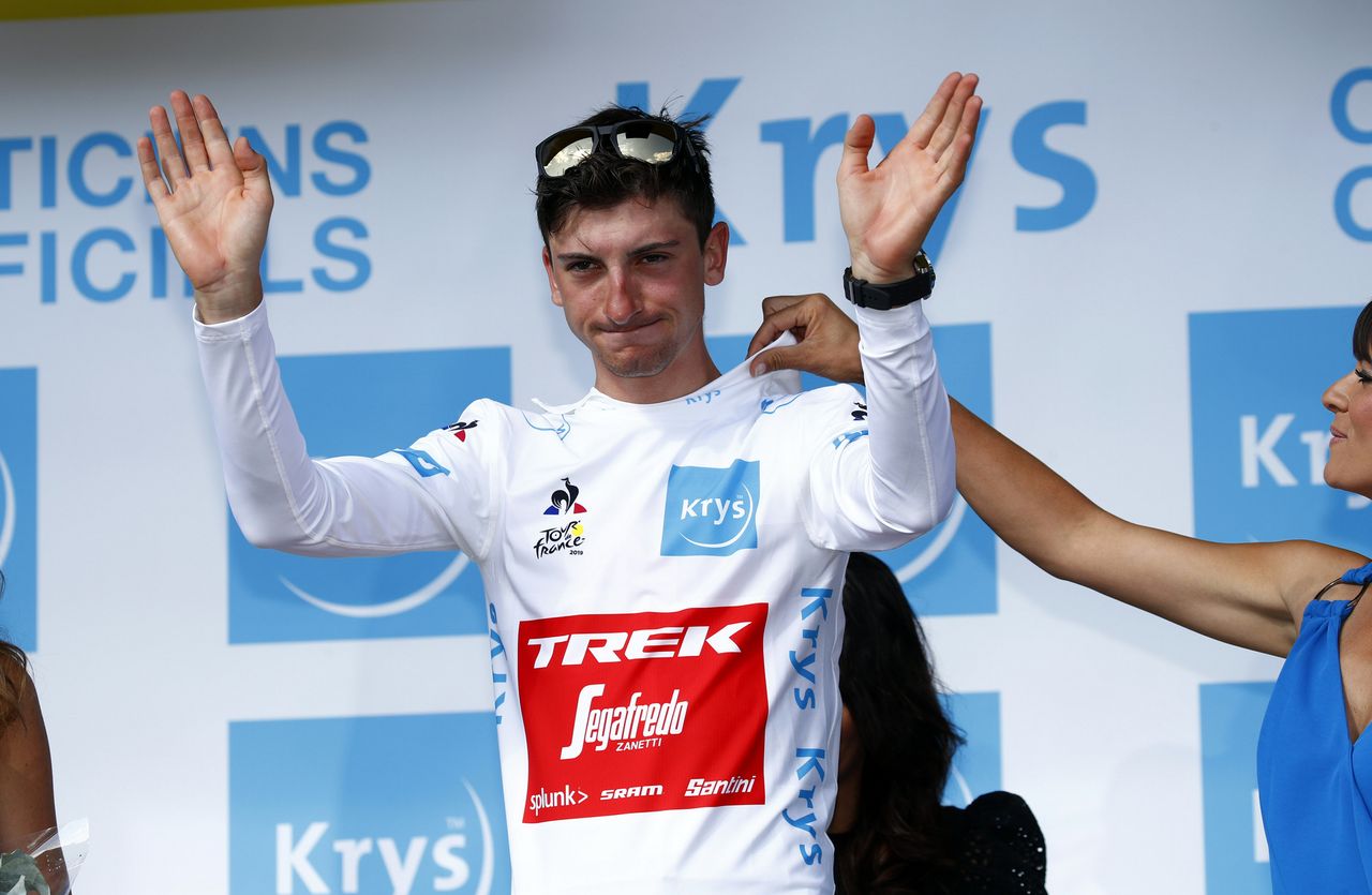 Giulio Ciccone consoled with the white jersey