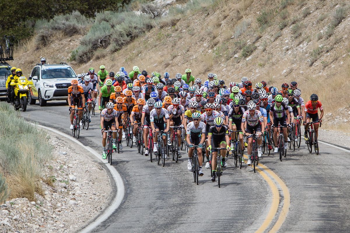 The peloton hits one of todays tough climbs.
