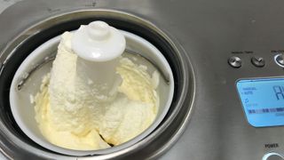 Breville Smart Scoop Ice Cream Maker making frozen yogurt, the lid is off and you can see some of the screen on the right hand side