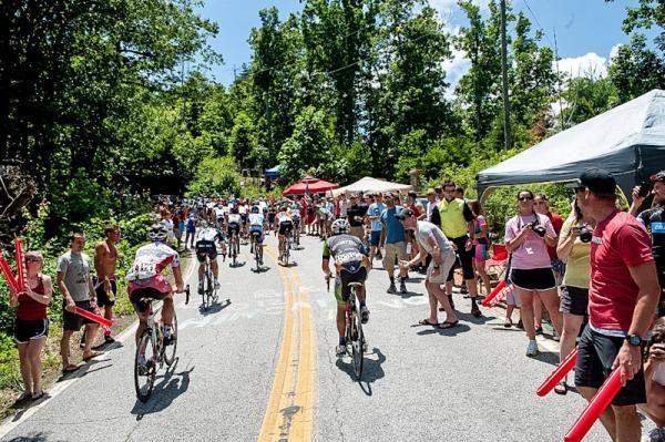 Riders make it to the top of the climb of Paris Mountain.
