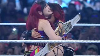 Iyo Sky celebrating her WWE Women's Championship victory