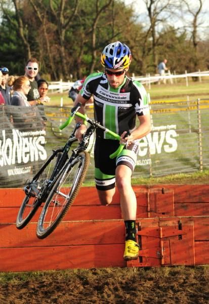 Timothy Johnson (Cannondale-Cyclocrossworld.com) is first over the barriers.