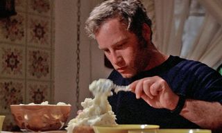 Roy Neary (Richard DreyFuss) sculpts mashed potatoes, in a daze, in "Close Encounters of the Third Kind" (1977).