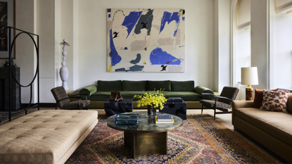 A living room with artwork as a focal point