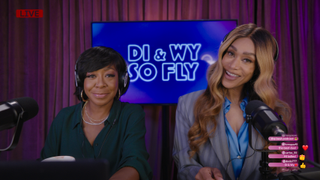 Tichina Arnold and Tami Roman as Wyvetta and Dione with headphones in So Fly Christmas