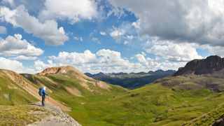 Hiker enjoys grand view of alpine tundra in Colorado