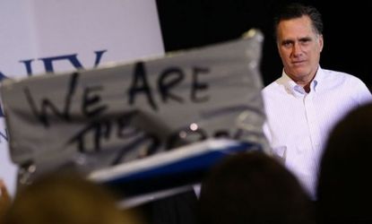 Mitt Romney has a brush with an Occupy protester while campaigning in New Hampshire: The former Massachusetts governor's business experience is being called into question, even by fellow Repu