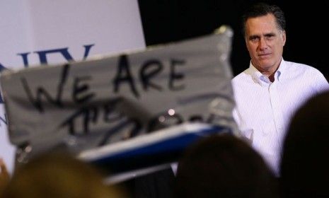 Mitt Romney has a brush with an Occupy protester while campaigning in New Hampshire: The former Massachusetts governor&amp;#039;s business experience is being called into question, even by fellow Repu