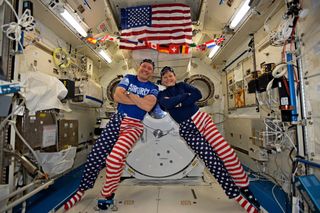 NASA astronauts Jack Fischer and tried a variety of poses in their stars-and-stripes gear to celebrate Independence Day 2017.