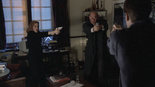 Mulder and Scully vs. Skinner in the "Paper Clip" episode of The X-Files