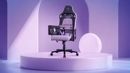 The Kuromi Razer collection, including the pointy-eared headset, mouse mat, mouse, and tenkeyless keyboard, is all perched on the seat of a purple and black gaming chair. The chair itself is also Kuromi themed, and it sits on top of a lilac plinth inside of a similarly coloured room. 