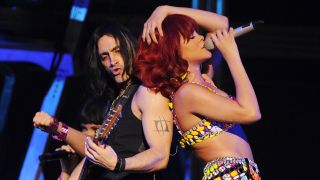 Rihanna and Nuno Bettencourt perform on stage together